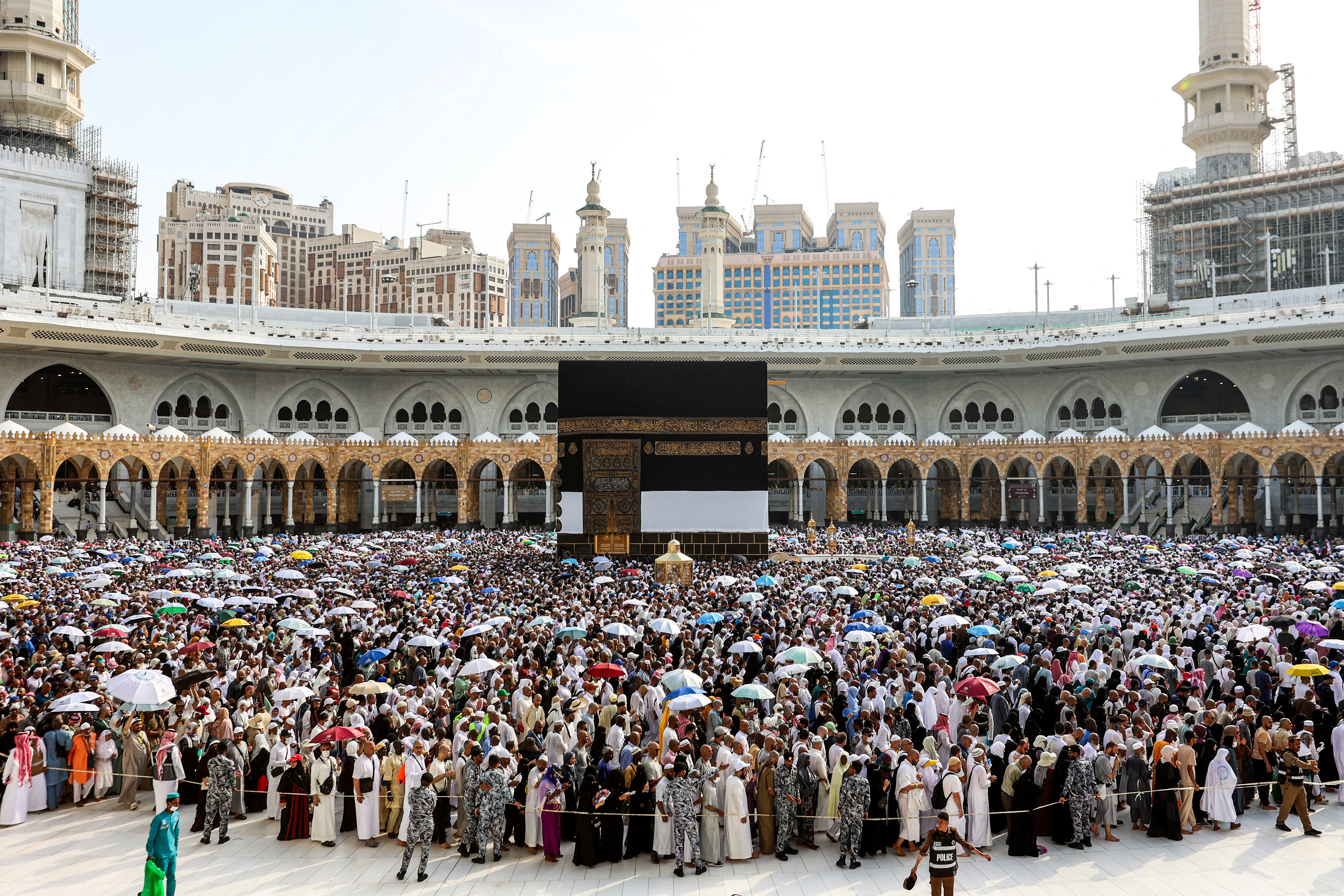 Muslim pilgrims perform the farewell circumambulation or "tawaf", circling seven times around the Kaaba, Islam's holiest shrine, at the Grand Mosque in the holy city of Mecca on June 18, 2024. [Getty Images]