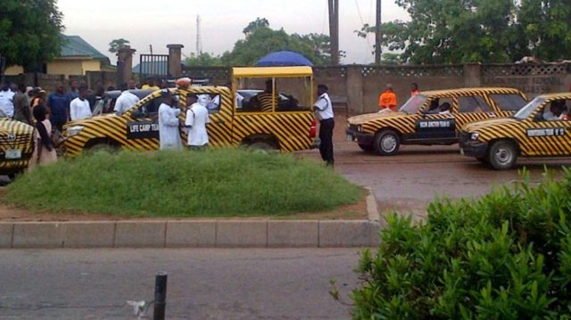 VIO officials during an inspection of vehicle papers.